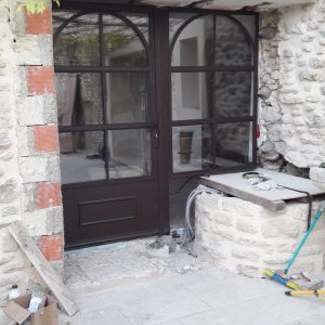 Porte vitrée en fer forgé réalisé par Guillaume Chauvin